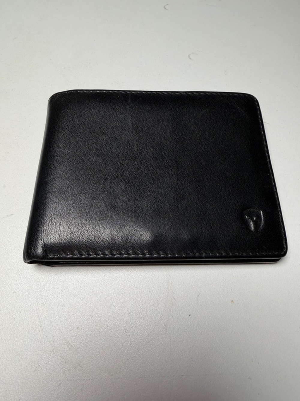 Men's Black Leather Bifold Wallet with Subtle Logo